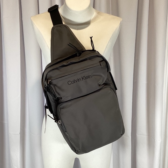 2042. Calvin Klein Gray Sling Bag NWT